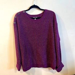 Purple knit sweater with shoulder buttons